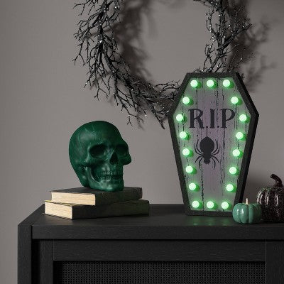  Plastic Skull Figurine - Hyde And EEK! Boutique™ Rich Dark Green